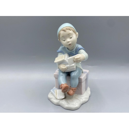 183 - Lladro figure 6898 Delivering Magic in good condition - height 15.5cm