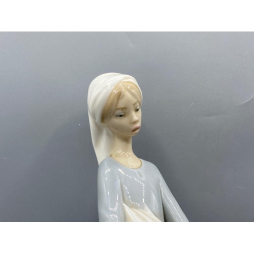 199 - Lladro 4866 ‘Girl with goose and dog’ in good condition - height 27cm