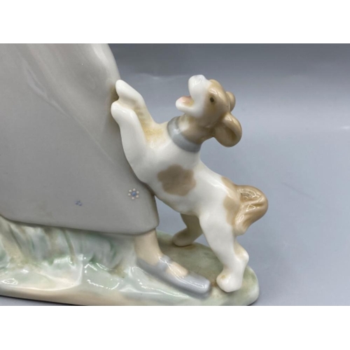 199 - Lladro 4866 ‘Girl with goose and dog’ in good condition - height 27cm