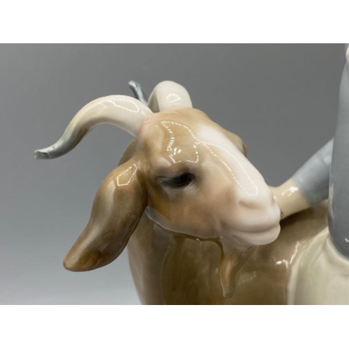 201 - Lladro 4812 ‘Girl with Goat’ in good condition - height 22.5cm