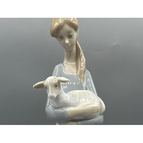 204 - Lladro 4505 ‘Girl with lamb’ in good condition, height 27cm