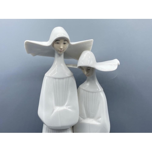 207 - Lladro 4611 ‘Two nuns’ in good condition, height 34cm, with original box