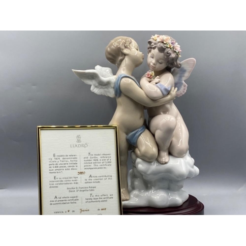 209 - Lladro 1824 Heaven and Earth in original box with certificate & wooden base, also has slight damage,... 