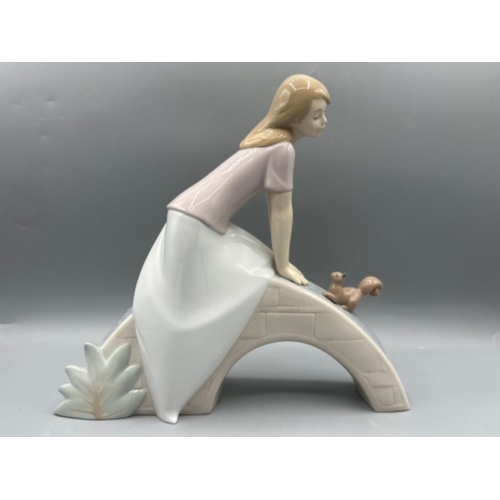 214 - Large Nao by Lladro figure 1589 A Dreamy Afternoon, good condition, H23cm X W25cm, with original box