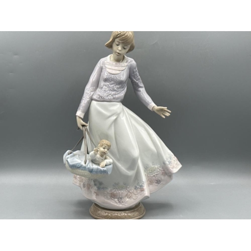 217 - Lladro 5874 ‘Off we go’, good condition (except part of basket has snapped) height 28cm