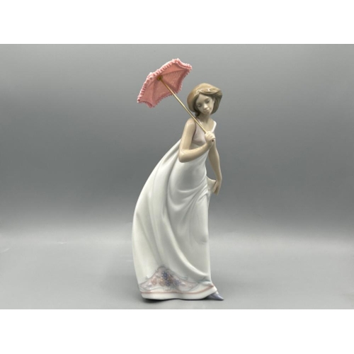 38 - Lladro signed 7636 ‘Afternoon promenade’ in good condition and original box