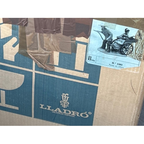 44 - Lladro 1383 ‘A Rickshaw ride’ in good condition with plinth and original box