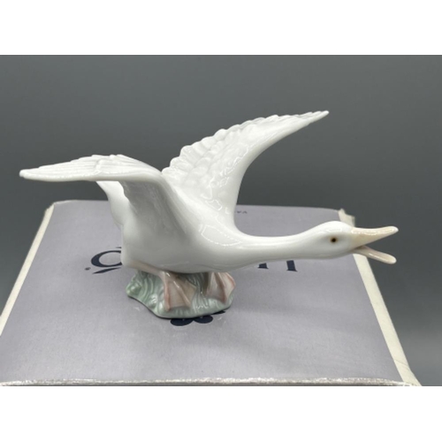 57 - Lladro 1264 ‘Duck’ and Lladro wallet in good condition and original boxes