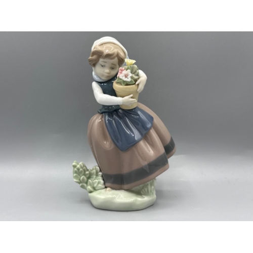 79 - Lladro figure 5233 Spring Is Here, signed on base, good condition, height 17.5cm, with original box