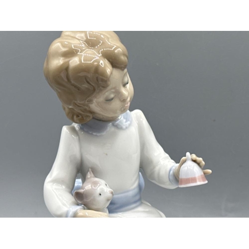 91 - Lladro “The Night Before Christmas Collection” figure 6671 Ringing In The Season, good condition, he... 