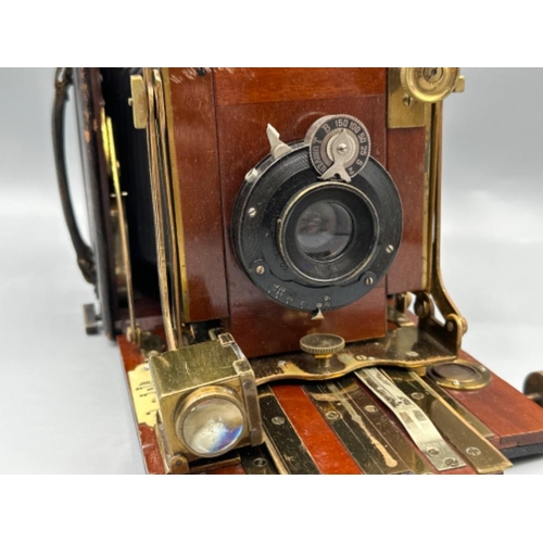 100 - Thornton Pickard folding Ruby mahogany & leather cased camera (1907)