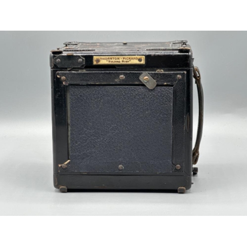 100 - Thornton Pickard folding Ruby mahogany & leather cased camera (1907)