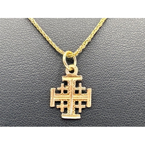 11 - Ladies 18ct gold fancy necklace with Jerusalem cross pendant, 48cms and 2.78g