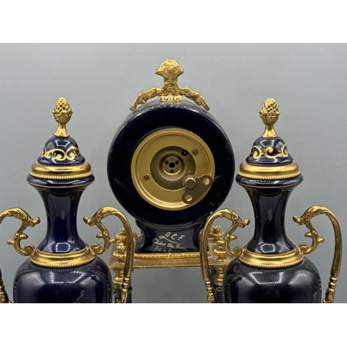 121 - A.C.F. Decor Bleu sevres “pait a la maim” porcelain clock with a pair of side-by-side matching twin ... 