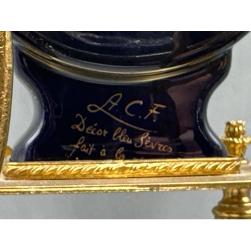 121 - A.C.F. Decor Bleu sevres “pait a la maim” porcelain clock with a pair of side-by-side matching twin ... 