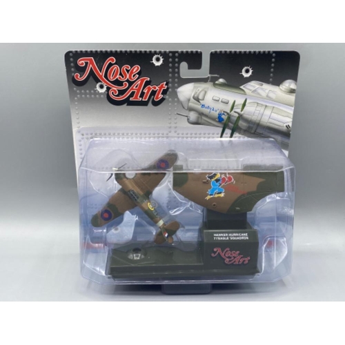 166 - 4 Corgi Nose Art model fighter planes ( see in image )