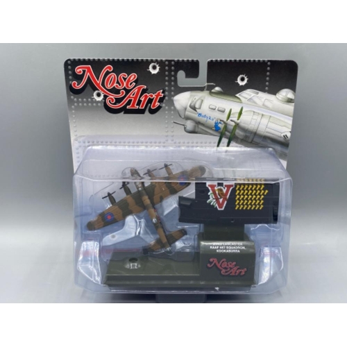 166 - 4 Corgi Nose Art model fighter planes ( see in image )