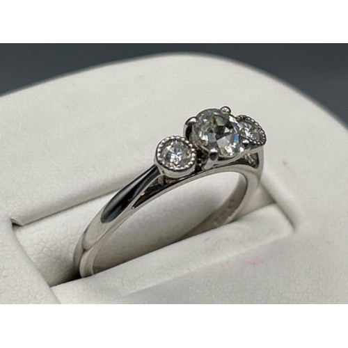 17 - Ladies 18ct white gold 3 stone diamond ring. Comprising of old cut diamond centre stone, approx 0.65... 