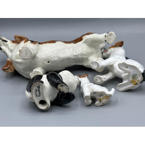 178 - Beswick Basset Hound & Beswick Panda, together with two Royal Doulton dogs