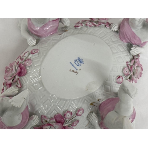 209 - PMP Porcelain “Germany” cherub centrepiece bowl - 34x29cm, Height 16.5cm