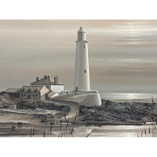 212 - Ivan Lindsay signed oil on canvas painting of St.Mary’s lighthouse, framed in a silver effect frame ... 