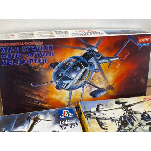 235 - 6 boxes of buildable fighter aircrafts to include F-14 A Tomcat and MI-24G Hind