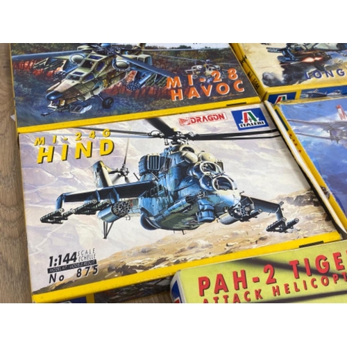 235 - 6 boxes of buildable fighter aircrafts to include F-14 A Tomcat and MI-24G Hind