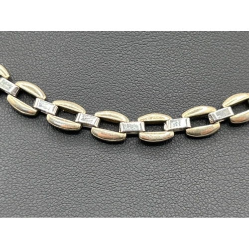 27 - Ladies 9ct two tone fancy gold chain, 38cms 22.94g