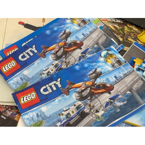 275 - Large quantity of lego building instructions