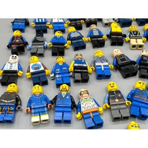 286 - Total of 54 Lego figures, all in blue uniforms