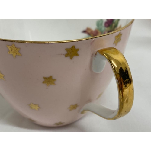 298 - 20 peice baby pink and 22kt accent tea set with floral design in good condition