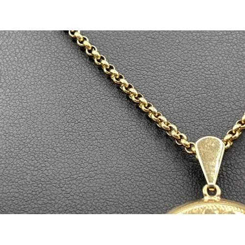 32 - Ladies 9ct gold round belcher chain and round locket pendant. 56cms and 10.78g