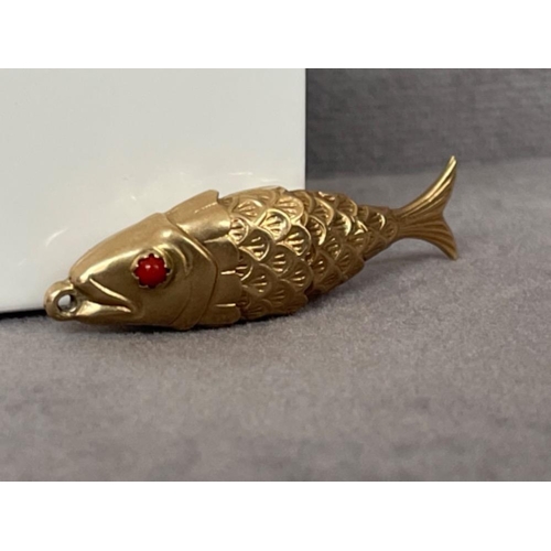 47 - 9ct Yellow Gold Fish Moveable Pendant with Red Stone Eyes - Weighing 3.58 grams and 4cm in length