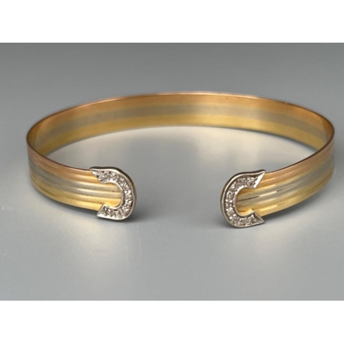 58 - Ladies 18ct 3 tone gold diamond bangle 12.4 grams