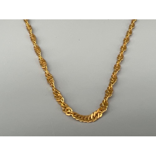 67 - Ladies 18ct gold ornate necklace. 6.95g