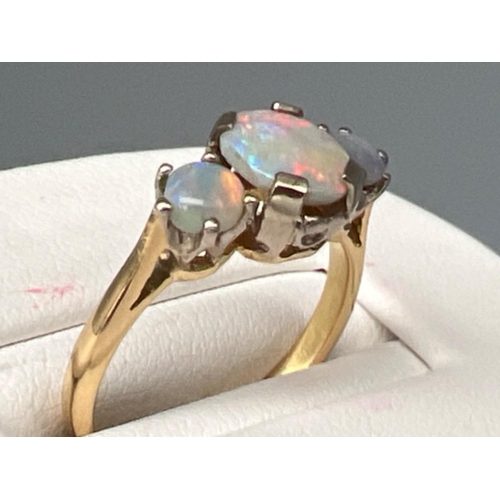 69 - Ladies 18ct gold Opal 3 stone ring. Size L 3.2g