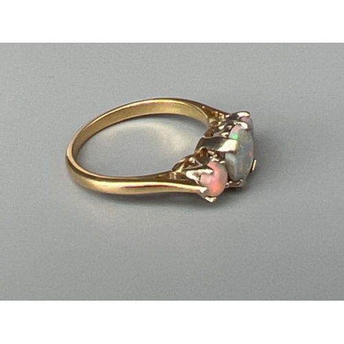 69 - Ladies 18ct gold Opal 3 stone ring. Size L 3.2g