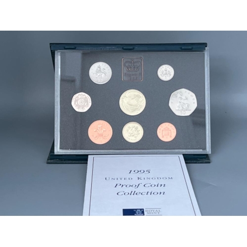 86 - UK Royal Mint proof coin collections including 1995, 1996 & 1997 all in original cases with certific... 