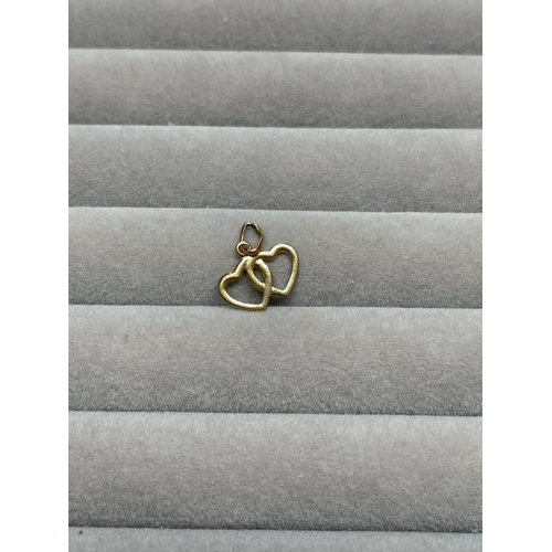 4 - 9ct Yellow Gold Double Heart Charm Weighing 0.47 grams