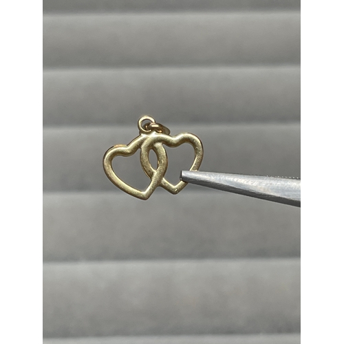 4 - 9ct Yellow Gold Double Heart Charm Weighing 0.47 grams