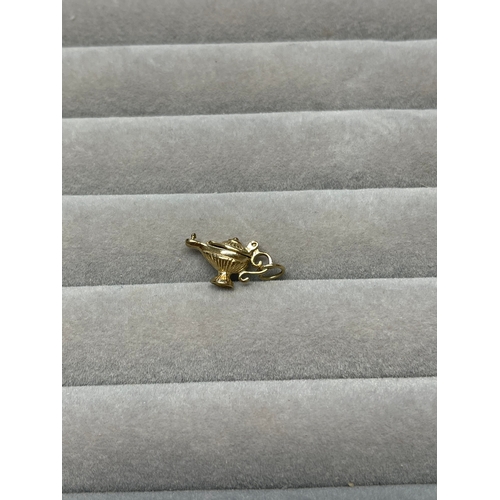 7 - 9ct Yellow Gold genie lamp charm weighing 1.58 grams