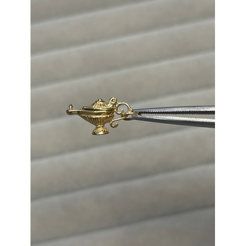 7 - 9ct Yellow Gold genie lamp charm weighing 1.58 grams