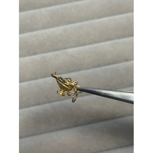 7 - 9ct Yellow Gold genie lamp charm weighing 1.58 grams