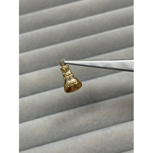 10 - 9ct Yellow Gold Fully Hallmarked 1000 Dollar Money Bag Charm Weighing 0.86 grams