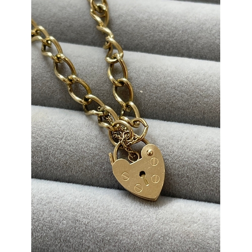 15 - 9ct Yellow Gold Love Heart Padlock Bracelet Featuring a S Charm Weighing 8.3 grams and Measuring 19c... 