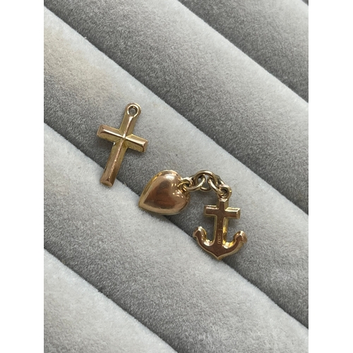 17 - Collection of three 9ct hallmarked charms including a cross, heart & anchor. This collection has a c... 