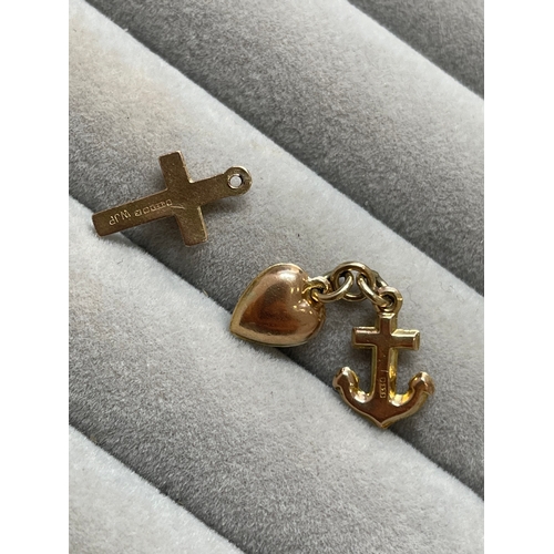 17 - Collection of three 9ct hallmarked charms including a cross, heart & anchor. This collection has a c... 