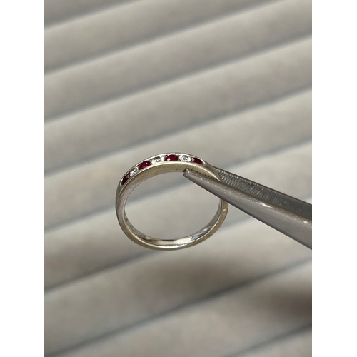 21 - 9ct White Gold Fully Hallmarked Diamond & Ruby Half Eternity Ring Weighing 2.35 grams Size M