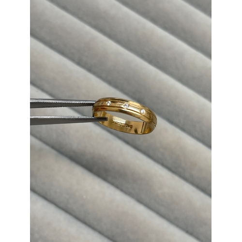 30 - 9ct Yellow Gold Fully Hallmarked Band Featuring 3 Diamonds Weighing 2.35 grams Size M