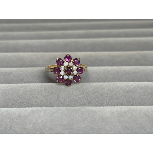 33 - 9ct Yellow Gold Garnet & Opal Flower Style Cluster Ring Weighing 2.5 grams Size N